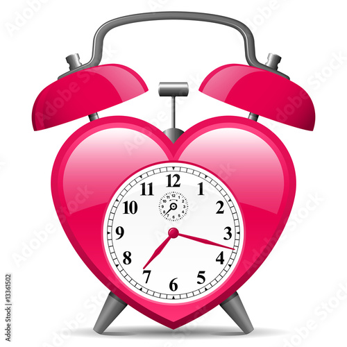 Classic alarm clock in heart shape