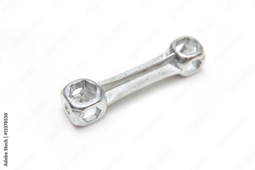Bicycle spanner isolated on a white studio background. Bicycle spanner isolated on a white studio background.