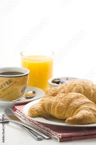 delicious continental breakfast of coffee and croissants