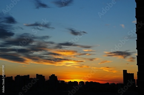 sunset  cloud and city