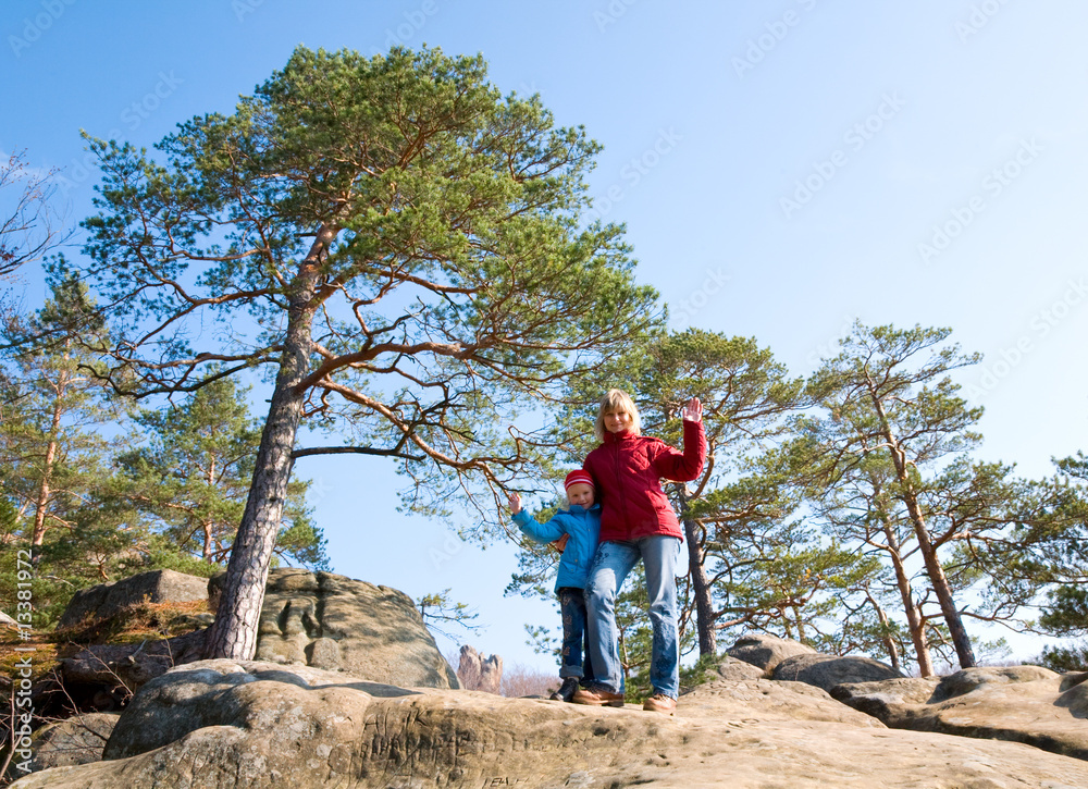 Family on rock
