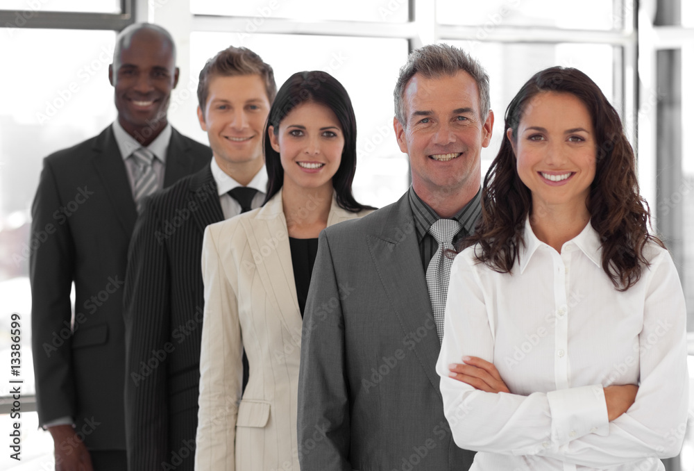 businesspeople from different cultures looking at camera businesspeople from different cultures looking at camera