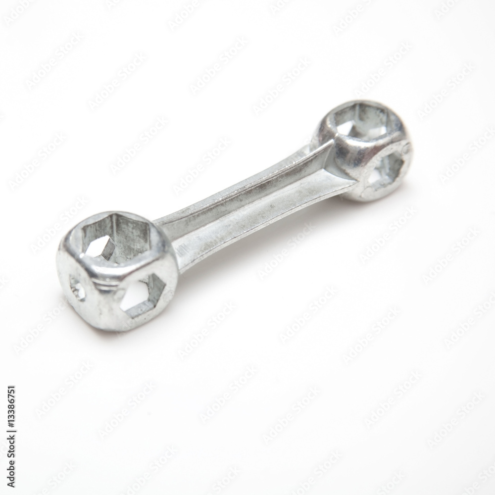 Bicycle spanner isolated on a white studio background. Bicycle spanner isolated on a white studio background.