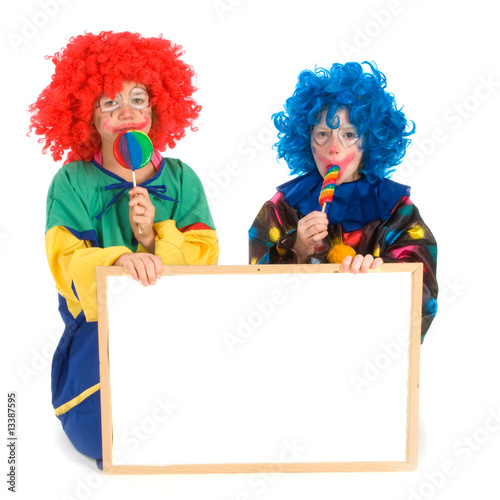 Clowns with text board