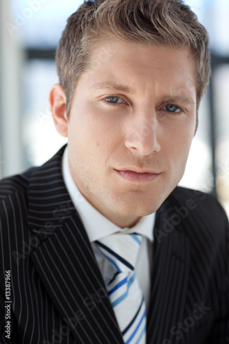 Attractive Businessman looking at camera