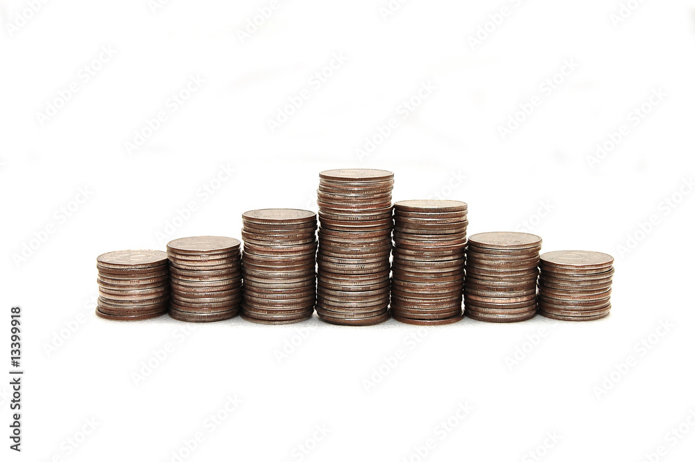 Pyramid combined from coins on a white background Pyramid combined from coins on a white background