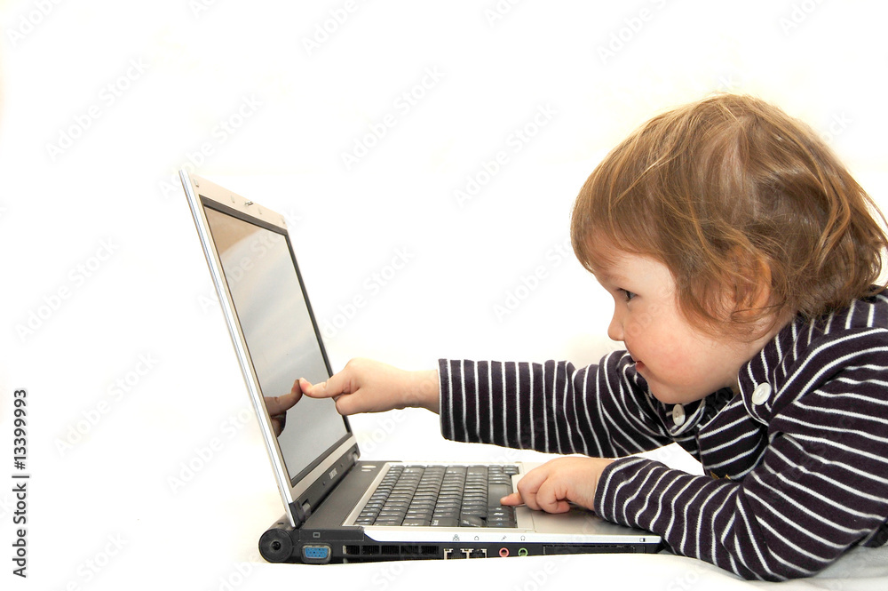 baby girl working on laptop isolated white baby girl working on laptop isolated white