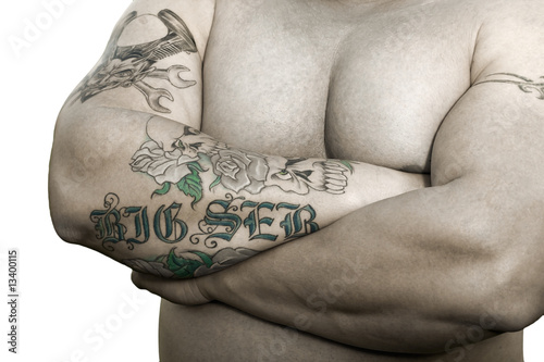 Strong man with tattoos photo