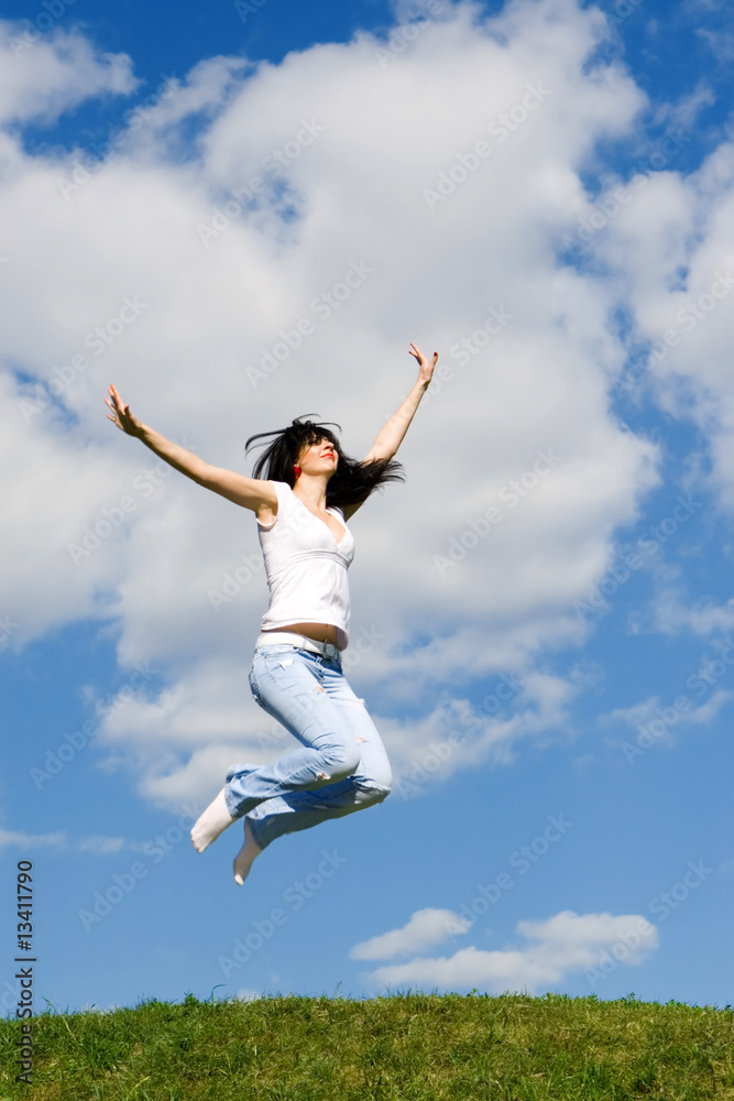 pretty young woman is jumping