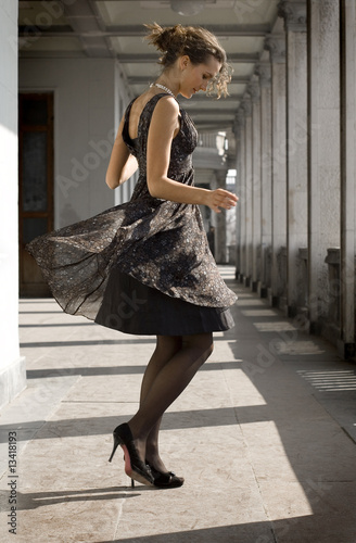 Girl dances in old building