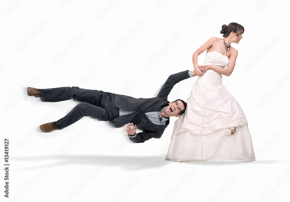 Bride abusing groom, isolated on white