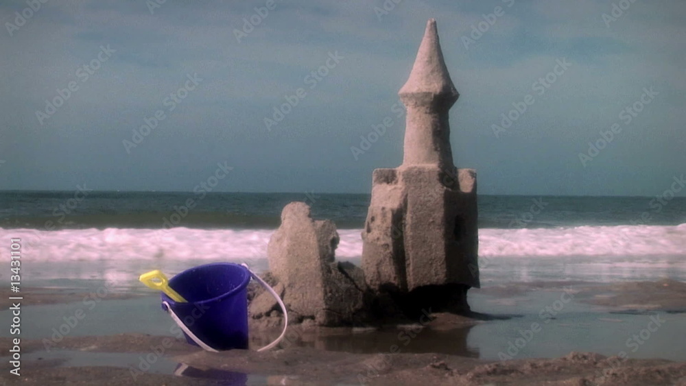 Seaside crumbling sand castle on Atlantic Carolina beach (1003)