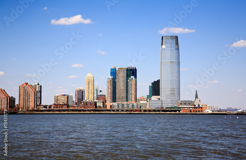 modern high-rise office buildings facing Manhattan