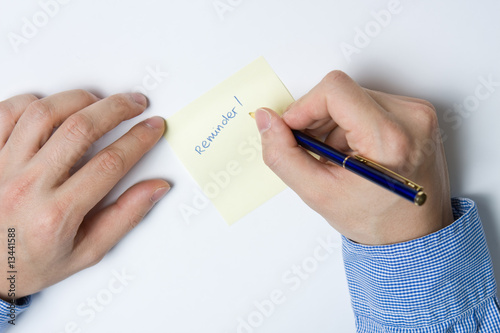 Person writing on paper
