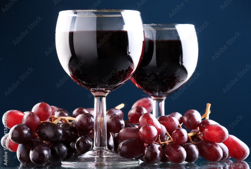 a glass of red wine and grape a glass of red wine and grape