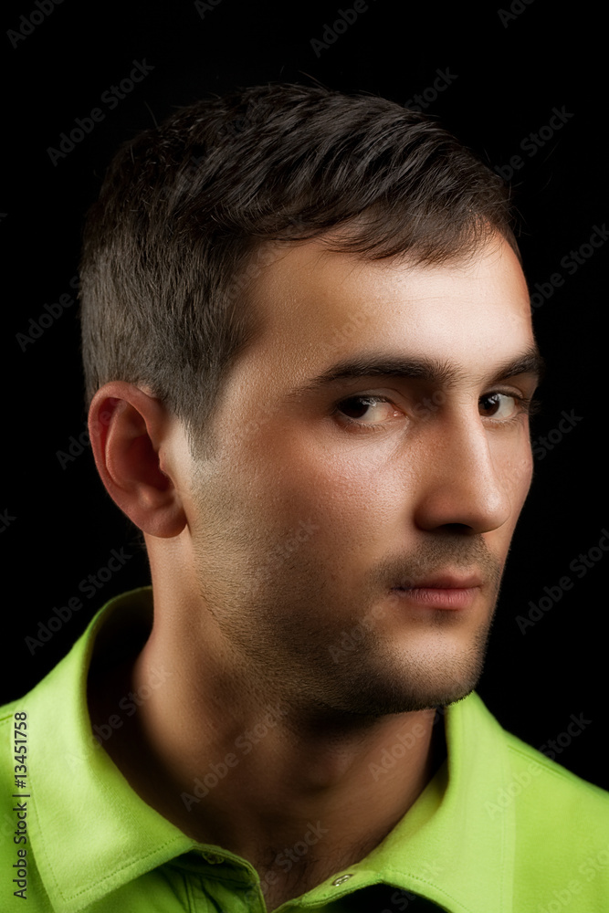 Fototapeta premium Young man over black