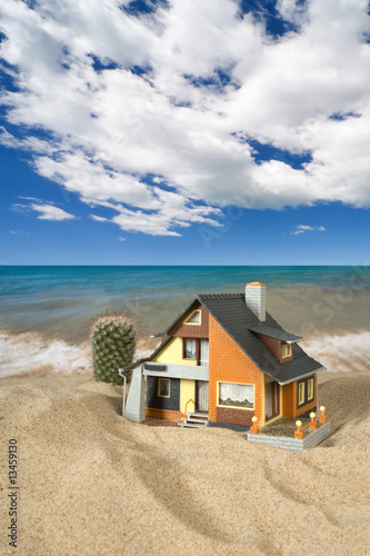House on sand. Real estate concept