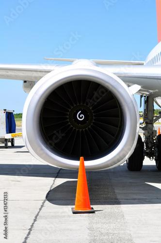 Air transportation: commercial airliner, wing and engine detail