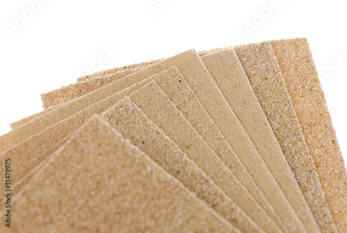 sandpaper, complete abrasive set with different grits on white photo