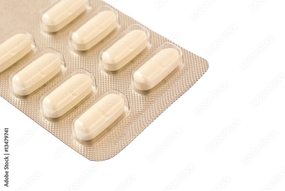 Pack of pills isolated over white background Pack of pills isolated over white background