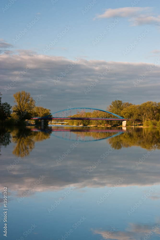 Bridge and Reflection On The River