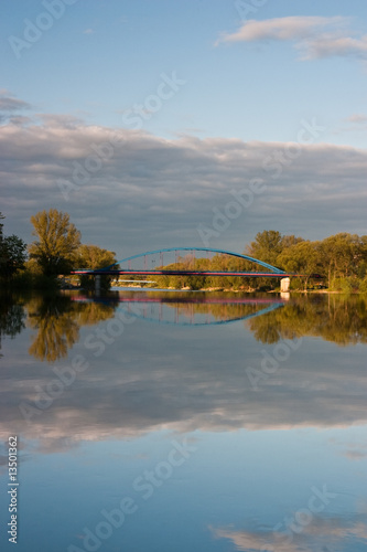 Bridge and Reflection On The River
