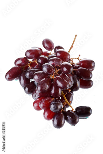 .Bunch of black grapes isolated on white background