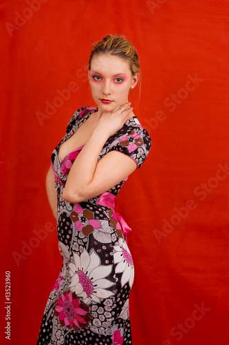 girl in color dress and bright make-up photo