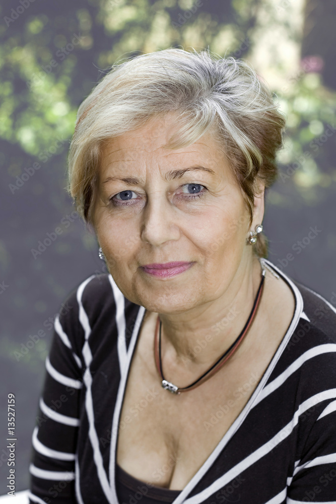 Old lady in her backyard Old lady in her backyard