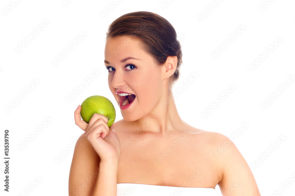 Young woman eating apple and smile over white background Young woman eating apple and smile over white background