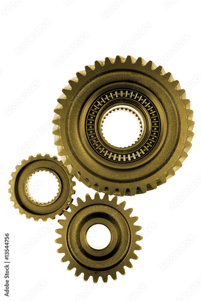 Three gears meshing together over white Three gears meshing together over white