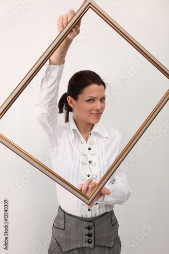 Girl with picture frame