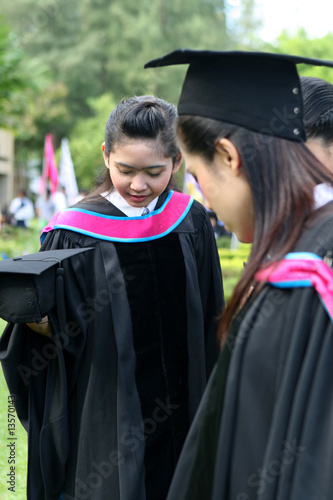 Gorgeous Asian university graduates. photo