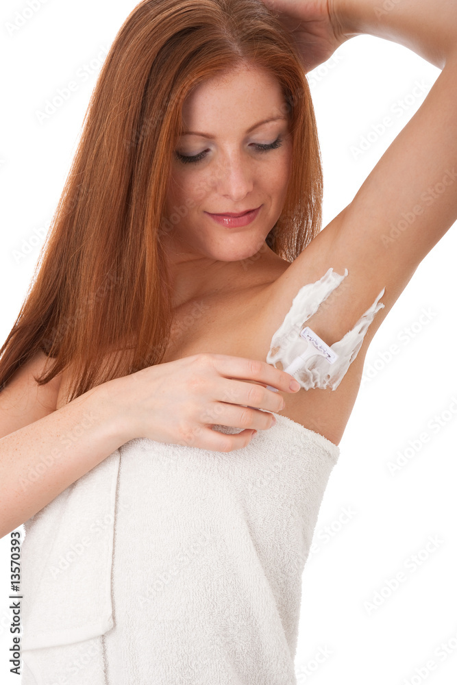 Body care series - Young woman shaving her armpit Body care series - Young woman shaving her armpit