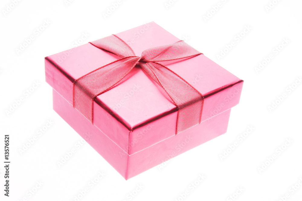 Fototapeta premium Pink giftbox and ribbon (closed) on white background