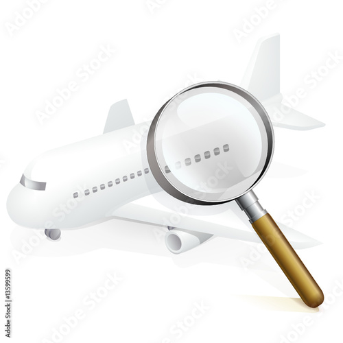 Avion commercial blanc à la loupe(reflet)