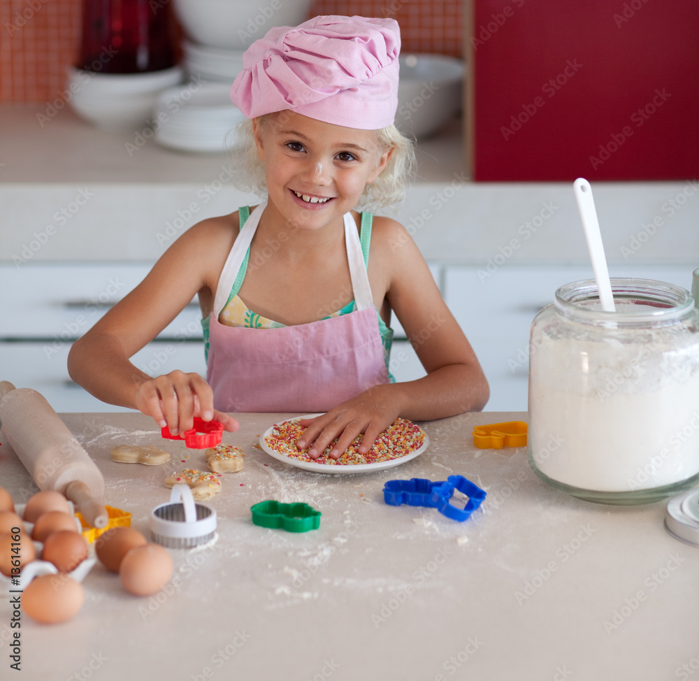 Beautiful young girl working in the kitchen Beautiful young girl working in the kitchen