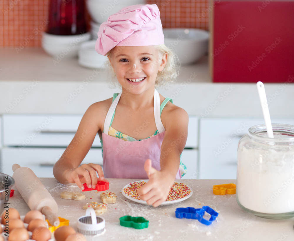 Beautiful young girl working in the kitchen Beautiful young girl working in the kitchen