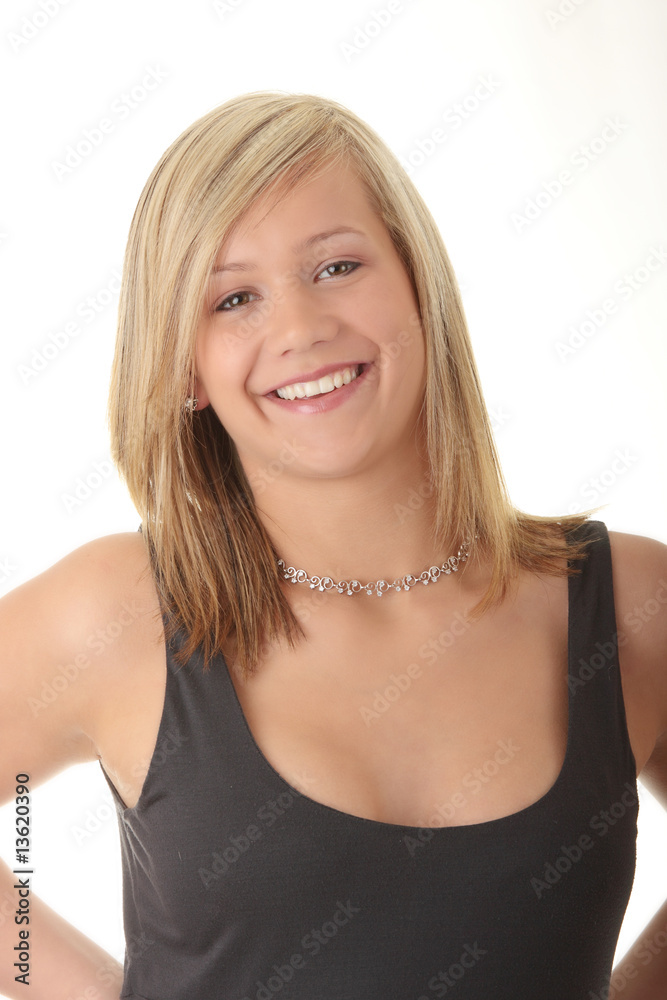 Beautiful teenager young blond girl in grey elegant dress Beautiful teenager young blond girl in grey elegant dress