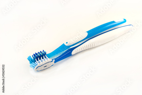 two toothbrushes on a white background