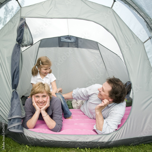 Happy family in tent © Gorilla