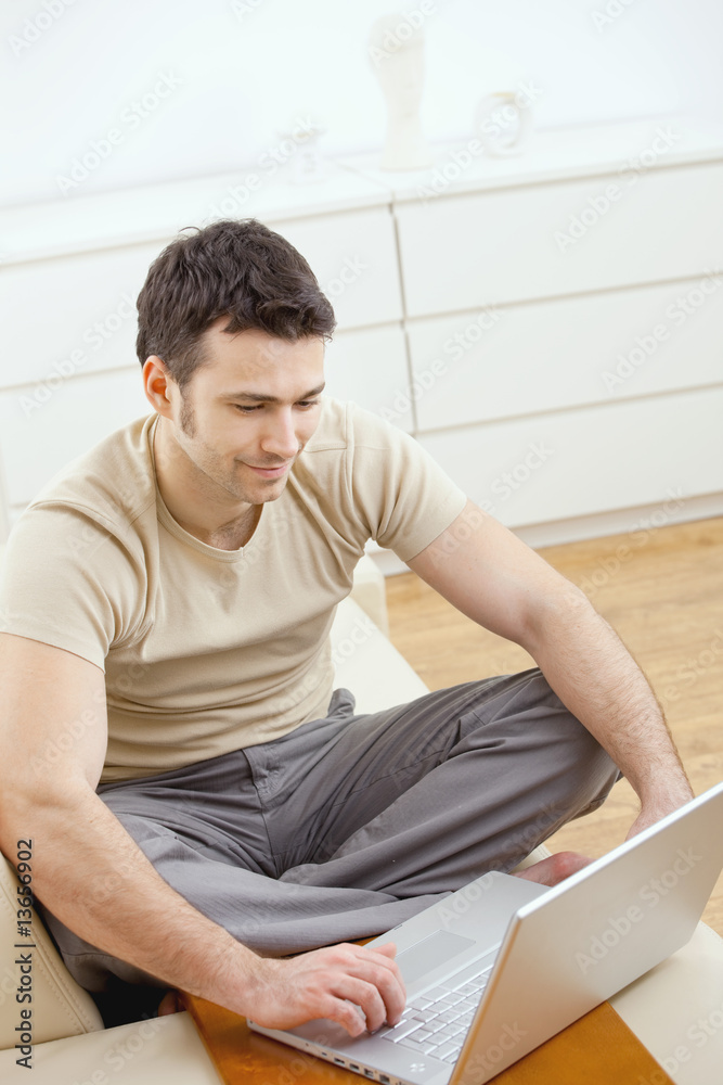 Happy man using computer Happy man using computer