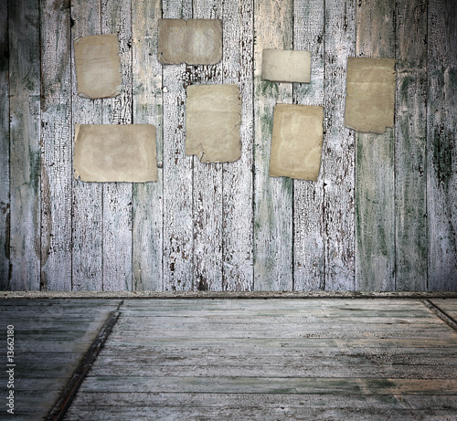 old interior with papers on walls photo