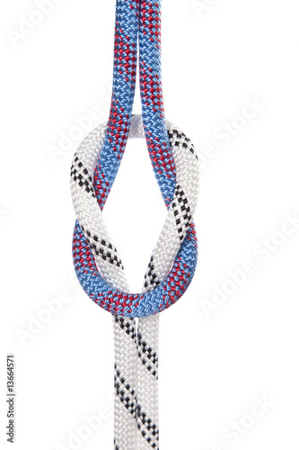 two climbing ropes, white and blue, connected together strongly