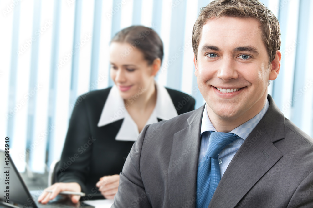 Portrait of successful businesswoman and colleague Portrait of successful businesswoman and colleague