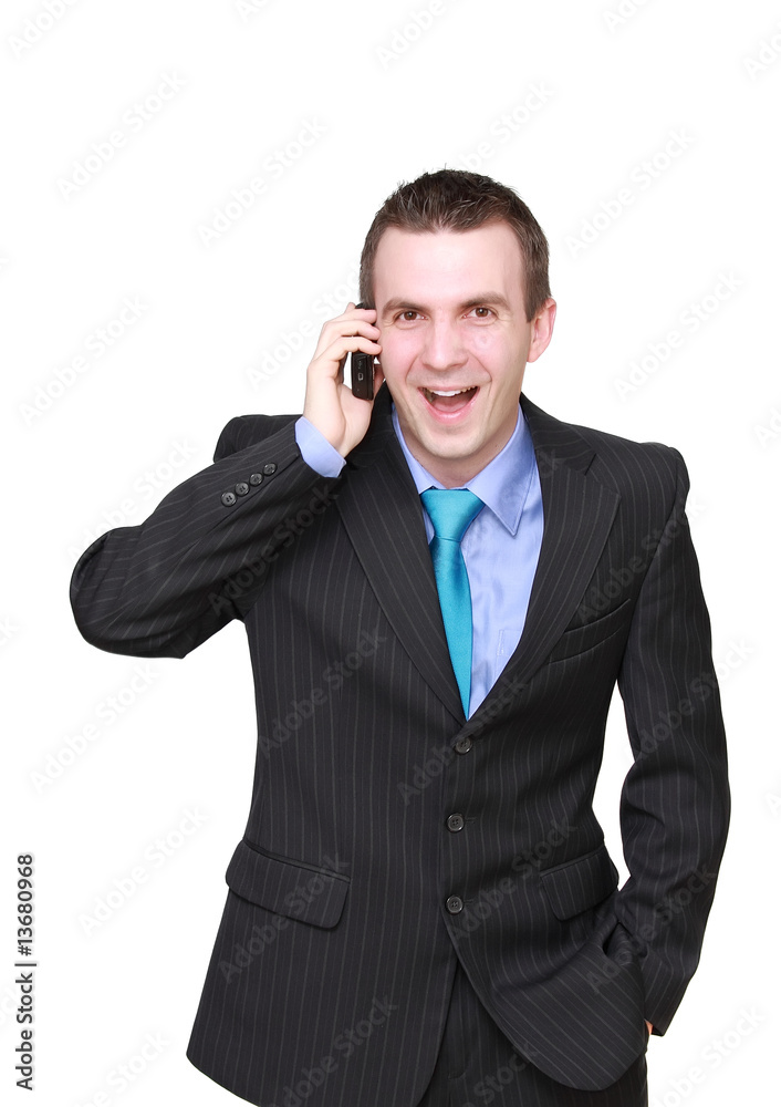 Cheerful young businessman with cell phone, lauthing Cheerful young businessman with cell phone, lauthing