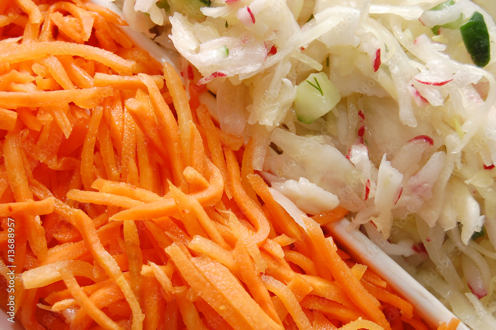 Close up of salad from carrots and cabbage Close up of salad from carrots and cabbage