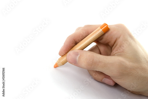 Pencil in man hand isolated on white background