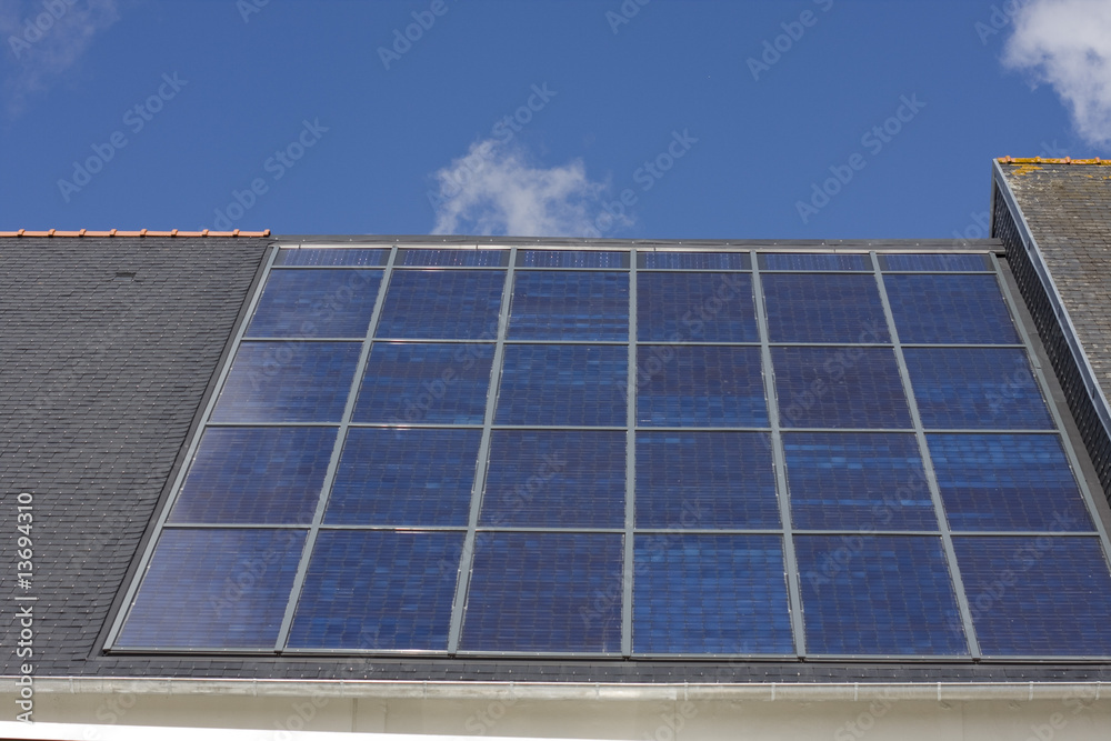 Fototapeta premium many solar cells on a roof