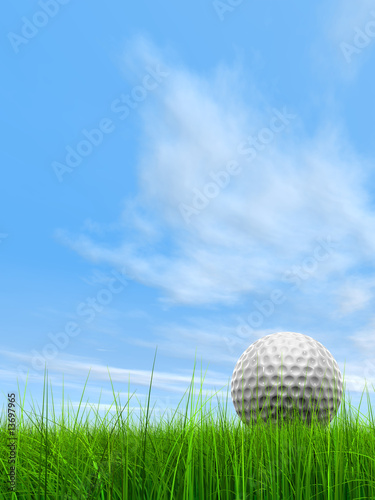 conceptual 3D golf ball on green grass over a blue sky